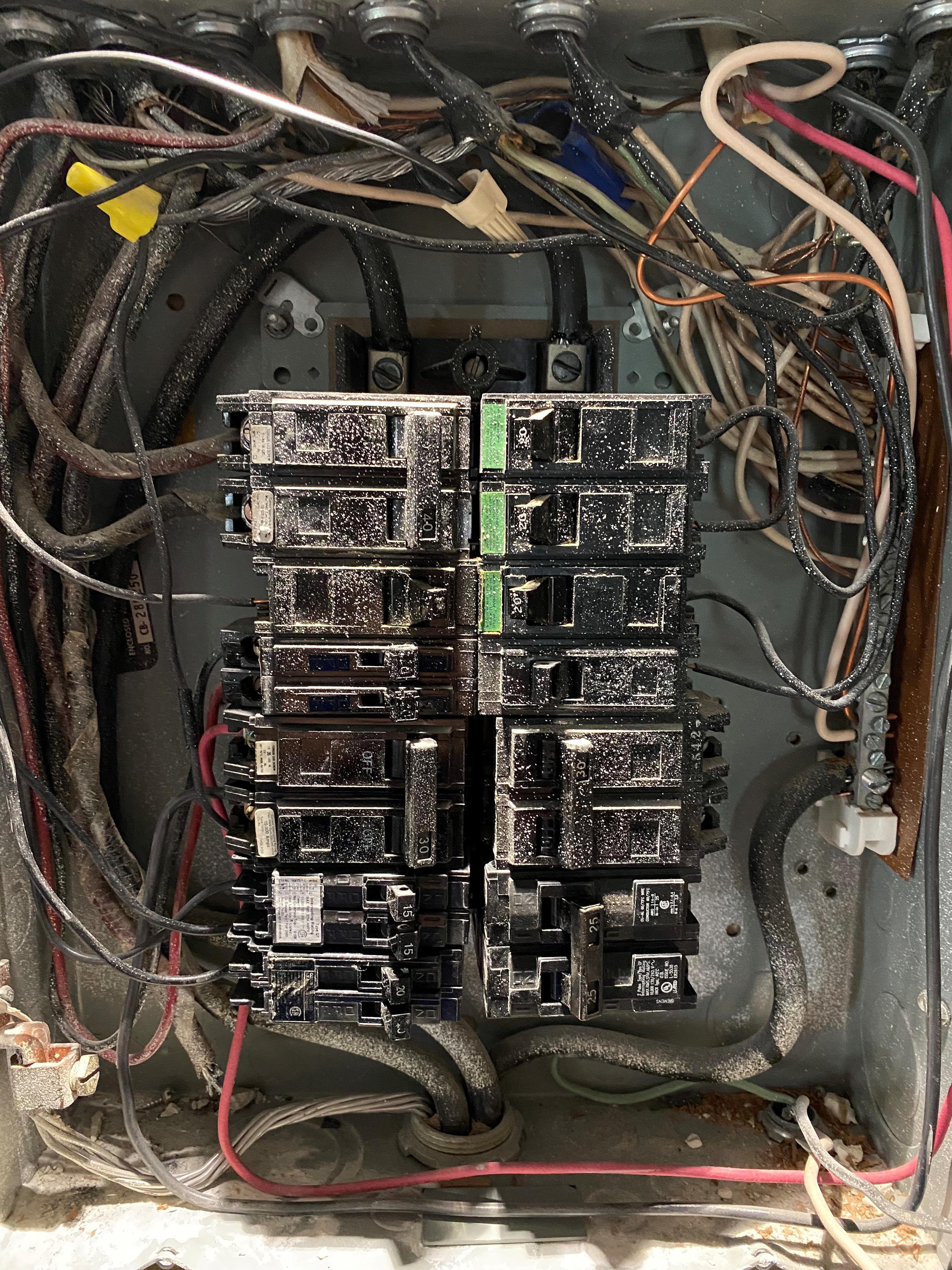 Atlanta electrician repairs burned electrical panel board